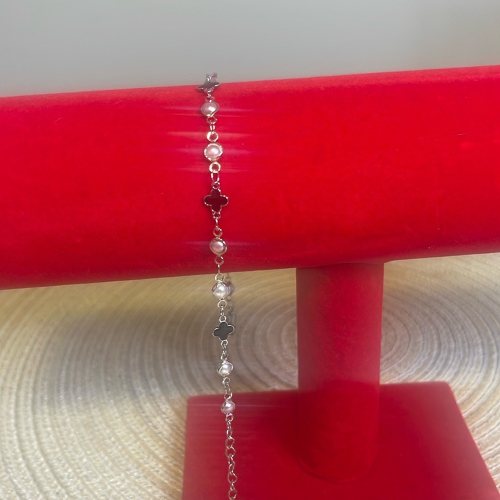 BN:Ankle bracelet in silver tone with white simulated pearls and black accents.